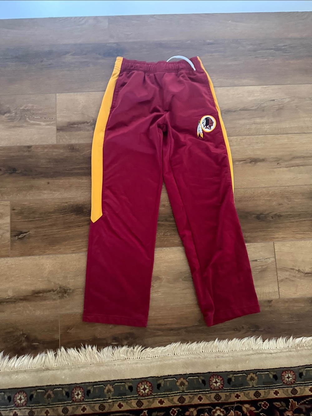 NFL Kids Burgundy Joggers with Gold Side Stripes and Team Patch